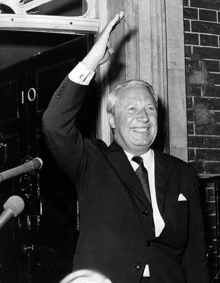 June 1970: The Prime Minister Edward Heath giving a victory wave as he arrives at 10, Downing Street after receiving his seal of office from the Queen. (Photo by Frank Barratt/Keystone/Getty Images)